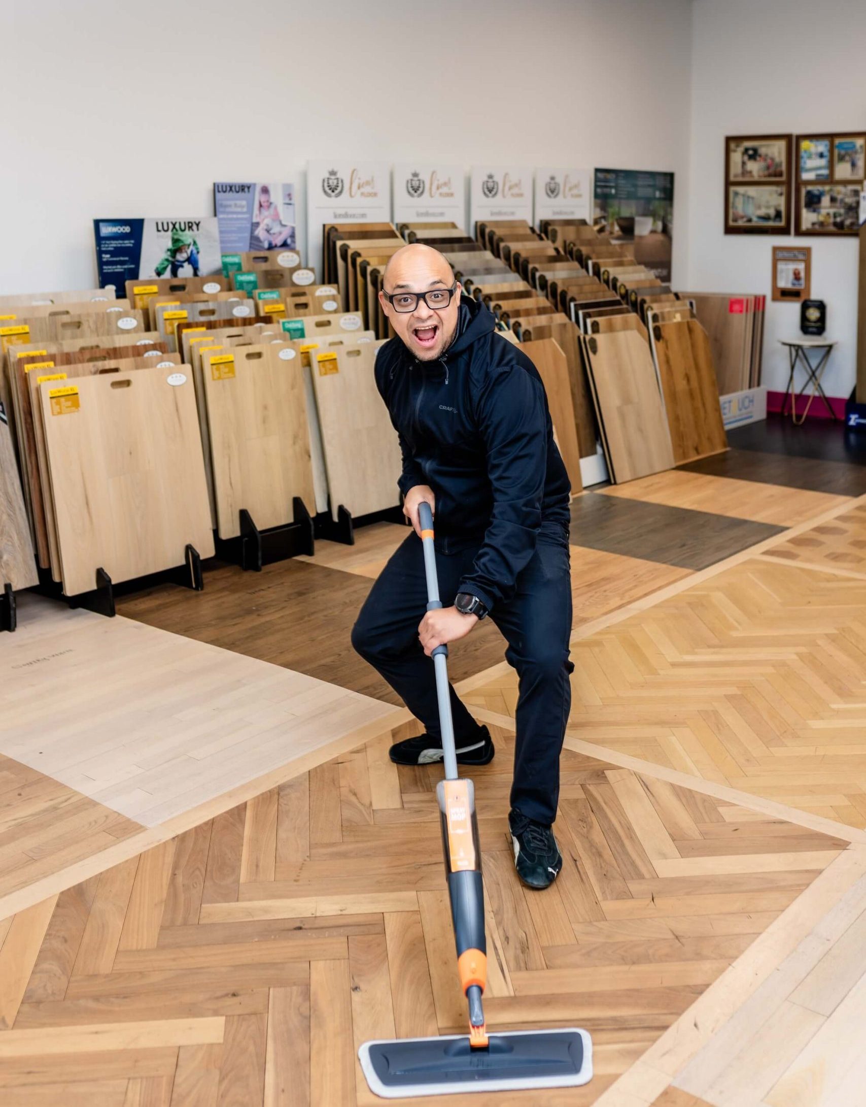 Hardwood floor refinishing service restoring a wood floor's shine