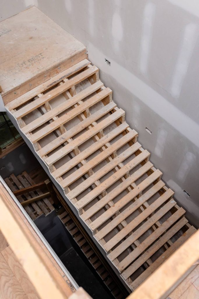 Hardwood boards acclimating on job site before installation