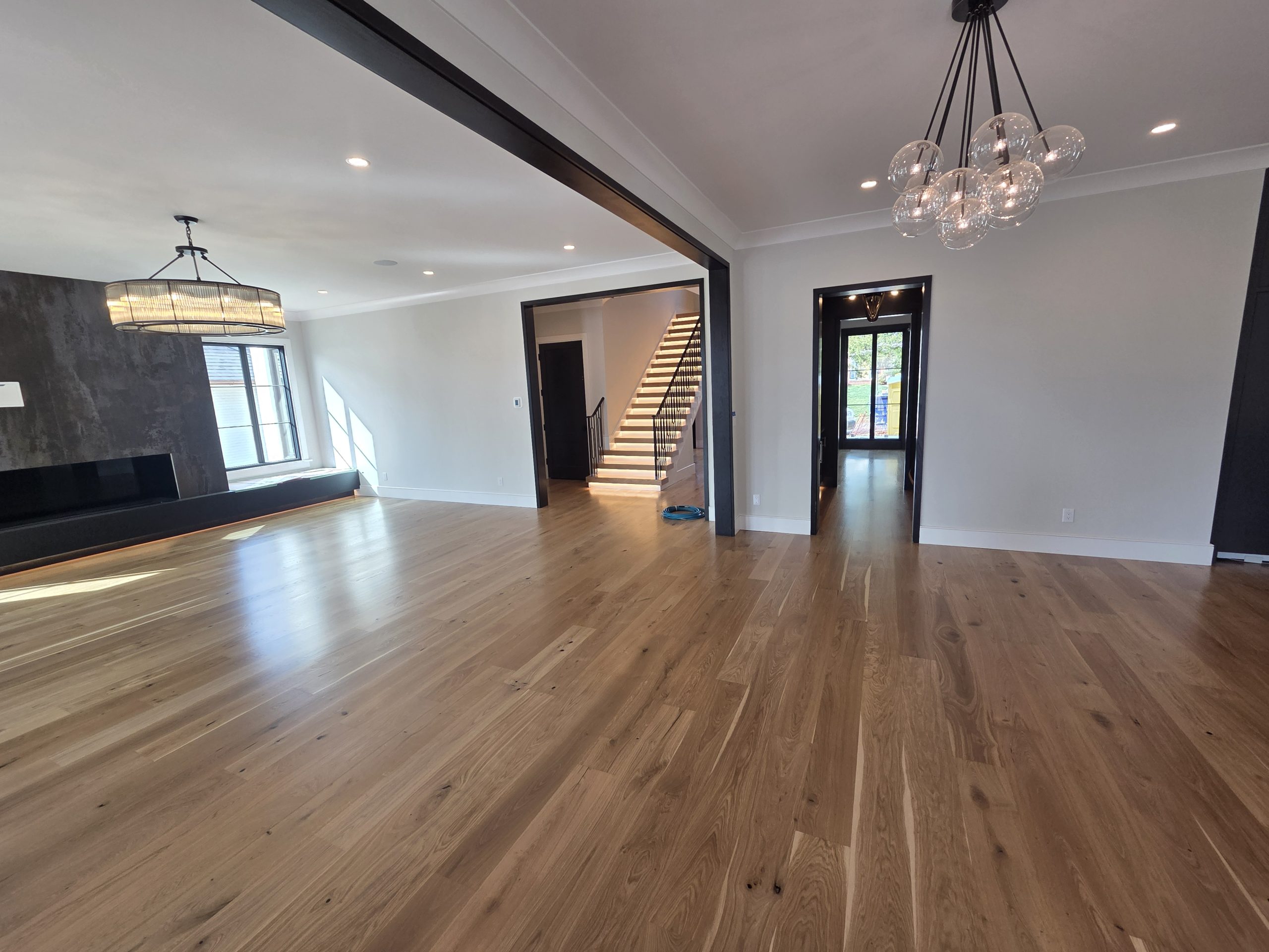 Hardwood flooring in an open concept residential living space